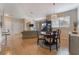 Open-concept living space featuring hardwood floors, and comfortable furnishings at 2325 Windmill Pkwy # 323, Henderson, NV 89074