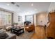 Elegant living room features hardwood floors, recessed lights, and an open floorplan at 2544 Sundew Ave, Henderson, NV 89052