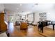 Open concept living room offers hardwood floors, recessed lights, and lots of seating at 2544 Sundew Ave, Henderson, NV 89052