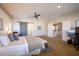 Large main bedroom with a barn door and view to stairway at 2544 Sundew Ave, Henderson, NV 89052