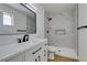 Bright bathroom with sleek white cabinets, a modern shower, and matte black accents at 2671 Diamante Cir, Las Vegas, NV 89121