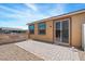 This backyard features a paved patio and a gravel area at 2685 Crystal Blue St, Laughlin, NV 89029