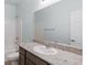 Bathroom featuring granite countertop, large mirror, and shower-tub combo at 2685 Crystal Blue St, Laughlin, NV 89029