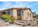 Inviting single-story home with desert landscaping and a charming front facade at 2685 Crystal Blue St, Laughlin, NV 89029