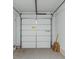 This garage features an automatic garage door and concrete flooring at 2685 Crystal Blue St, Laughlin, NV 89029