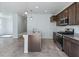This kitchen has stainless steel appliances, granite countertops and an island at 2685 Crystal Blue St, Laughlin, NV 89029