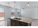 Kitchen island sink with granite countertops and stainless steel dishwasher at 2685 Crystal Blue St, Laughlin, NV 89029