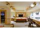 Basement bar area with seating, tv and shelving, plus billiard table entertainment space at 3 Anthem Pointe Ct, Henderson, NV 89052