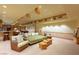 Large open basement area with a seating area and entertainment space at 3 Anthem Pointe Ct, Henderson, NV 89052