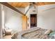 Bright bedroom showcases a ceiling fan, wooden beams, and cozy chair at 3 Anthem Pointe Ct, Henderson, NV 89052