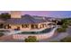 An infinity pool wraps around this luxurious estate, with an amazing patio for lounging and entertaining at 3 Anthem Pointe Ct, Henderson, NV 89052