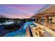 Inviting infinity pool and spa area overlooking the backyard, blending luxury with nature's beauty at 3 Anthem Pointe Ct, Henderson, NV 89052