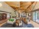 Spacious living room featuring a large sofa, fireplace and lots of natural light at 3 Anthem Pointe Ct, Henderson, NV 89052
