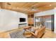 Bright living room with a wood-paneled ceiling and an open view to a second living space at 3 Anthem Pointe Ct, Henderson, NV 89052