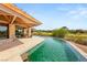 Stunning pool merges with the outdoor golf course at 3 Anthem Pointe Ct, Henderson, NV 89052