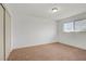 This comfortable bedroom features neutral colored walls and plush carpeting at 304 Orland St # 47, Las Vegas, NV 89107