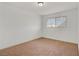 This comfortable bedroom features neutral colored walls and plush carpeting at 304 Orland St # 47, Las Vegas, NV 89107