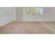 Bright living room area with mixed flooring, and exterior views at 304 Orland St # 47, Las Vegas, NV 89107