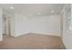 Spacious living room ready for personalization, with neutral carpet and ample natural light at 304 Orland St # 47, Las Vegas, NV 89107