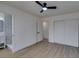 Bright main bedroom features wood floors, ceiling fan, walk-in closet and ensuite bathroom at 3040 Carroll St, North Las Vegas, NV 89030