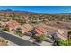 View of beautiful homes in a well-planned residential neighborhood with desert landscaping at 3091 Via Del Corso, Henderson, NV 89052