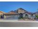 Attractive home boasting a well-maintained yard and a convenient three-car garage at 3091 Via Del Corso, Henderson, NV 89052