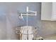 Kitchen detail highlighting a pot filler faucet over a professional-grade range at 3091 Via Del Corso, Henderson, NV 89052
