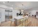 Open-concept kitchen featuring a large island, stainless steel appliances, and ample cabinet space at 3091 Via Del Corso, Henderson, NV 89052