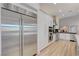 Modern kitchen featuring stainless steel appliances and custom cabinets at 3091 Via Del Corso, Henderson, NV 89052