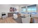 Cozy living space with comfortable seating, elegant decor, and ample natural light at 3091 Via Del Corso, Henderson, NV 89052