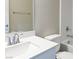 Bathroom with a tub shower, and white cabinets at 3767 Paseo De Paz Ave, Las Vegas, NV 89115