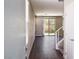 Inviting home entryway with hardwood floors and staircase leading to the upper level at 3767 Paseo De Paz Ave, Las Vegas, NV 89115