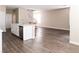 Spacious living and dining area featuring hardwood floors and modern design at 3767 Paseo De Paz Ave, Las Vegas, NV 89115