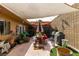 Private backyard featuring ample lighting and patio furniture at 3879 Atlantis St, Las Vegas, NV 89121