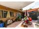 Private backyard featuring ample lighting and patio furniture at 3879 Atlantis St, Las Vegas, NV 89121