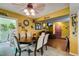 Open concept dining area featuring a view into the cozy living room at 3879 Atlantis St, Las Vegas, NV 89121