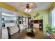 Inviting dining space with view to kitchen and stainless steel refrigerator at 3879 Atlantis St, Las Vegas, NV 89121