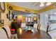 Open dining area with views to the living room and updated kitchen space at 3879 Atlantis St, Las Vegas, NV 89121