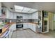 Modern kitchen with stainless steel appliances and bright white cabinetry at 3879 Atlantis St, Las Vegas, NV 89121