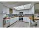Bright kitchen featuring white cabinets, butcher block countertops, stainless steel appliances, and stylish backsplash at 3879 Atlantis St, Las Vegas, NV 89121