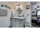 Bright main bathroom featuring marble countertops and vanity at 3879 Atlantis St, Las Vegas, NV 89121