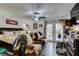 Bright and airy primary bedroom with hardwood floors, ceiling fan, and French doors leading to the outside at 3879 Atlantis St, Las Vegas, NV 89121