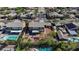 Aerial view of a backyard oasis showcasing mature trees, and a cozy fire pit at 3934 Sangre De Cristo Ave, Las Vegas, NV 89118