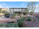 Large backyard featuring a covered patio, dining area, and desert landscaping at 3934 Sangre De Cristo Ave, Las Vegas, NV 89118