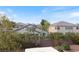 View of the backyard featuring privacy wall and glimpse of neighboring properties at 3934 Sangre De Cristo Ave, Las Vegas, NV 89118