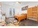 Bright bedroom featuring a comfortable bed, stylish decor, natural light, and a large cabinet at 3934 Sangre De Cristo Ave, Las Vegas, NV 89118