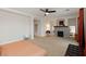 Large bedroom with a fireplace, ceiling fan, and ample lighting, and an adjacent seating area at 3934 Sangre De Cristo Ave, Las Vegas, NV 89118