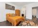 Bright bedroom featuring a comfortable bed with colorful pillows and stylish decor and a bathroom adjacent at 3934 Sangre De Cristo Ave, Las Vegas, NV 89118