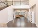 Open foyer leading to a spacious living area, showcasing modern design and natural light at 3934 Sangre De Cristo Ave, Las Vegas, NV 89118