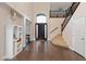 Grand foyer boasting high ceilings, elegant staircase, and sleek design elements at 3934 Sangre De Cristo Ave, Las Vegas, NV 89118